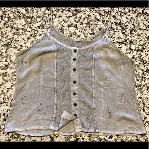 Flattering. Detailed. Strong sturdy fabric.